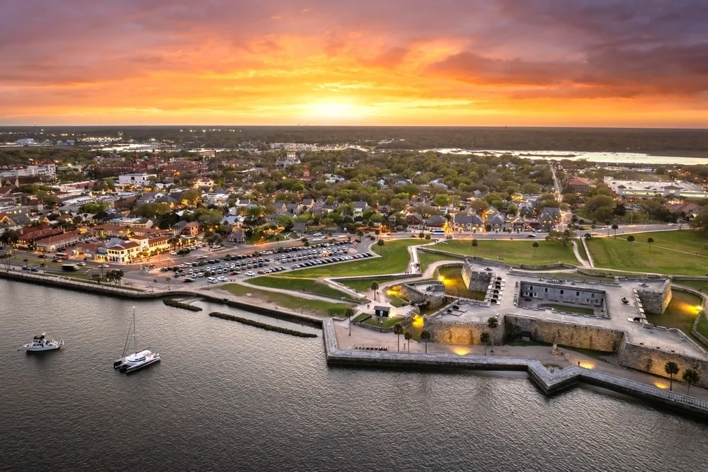 Historic St. Augustine waterfront and Castillo de San Marcos at sunset